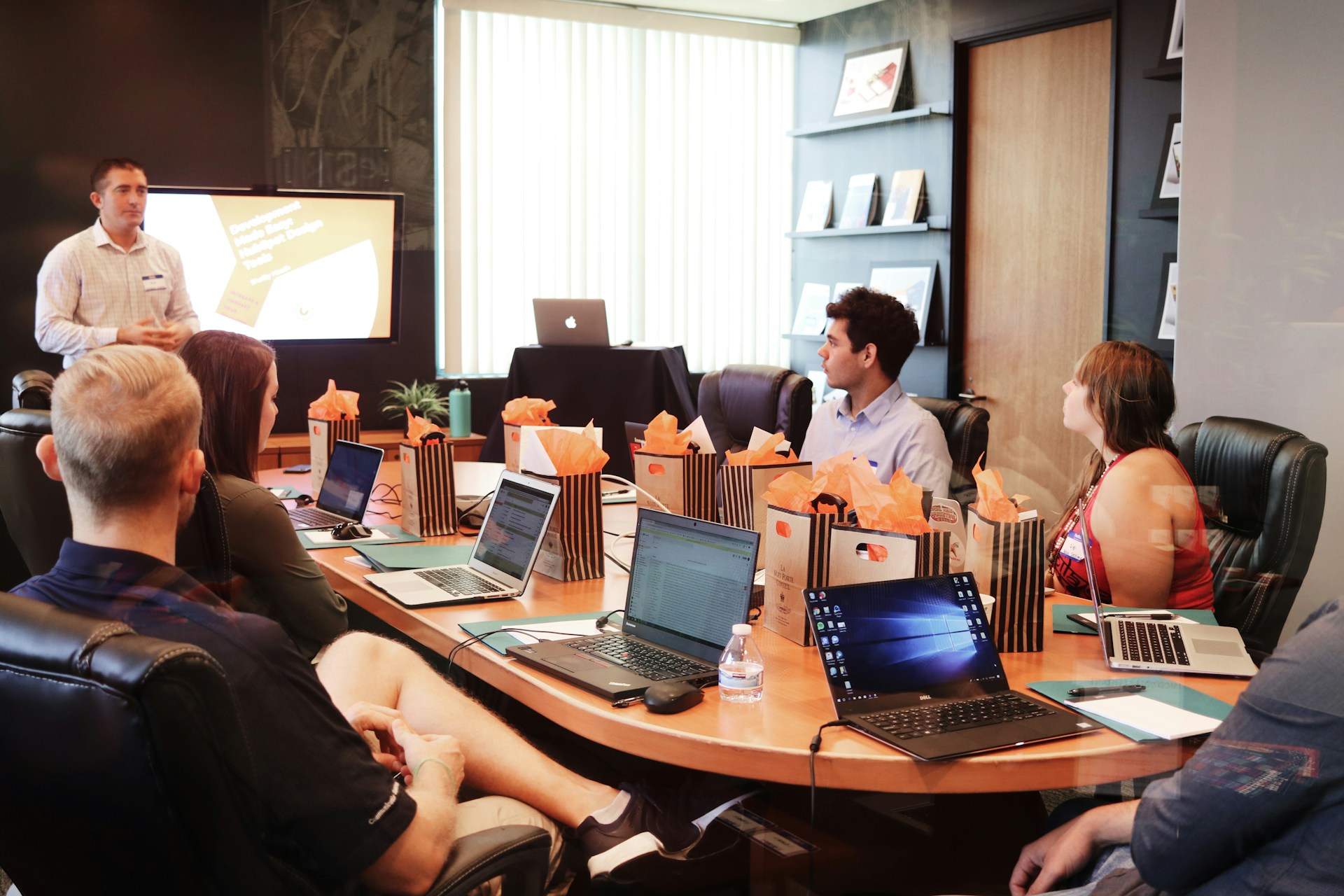A group of people in a meeting about building a sub-agent network