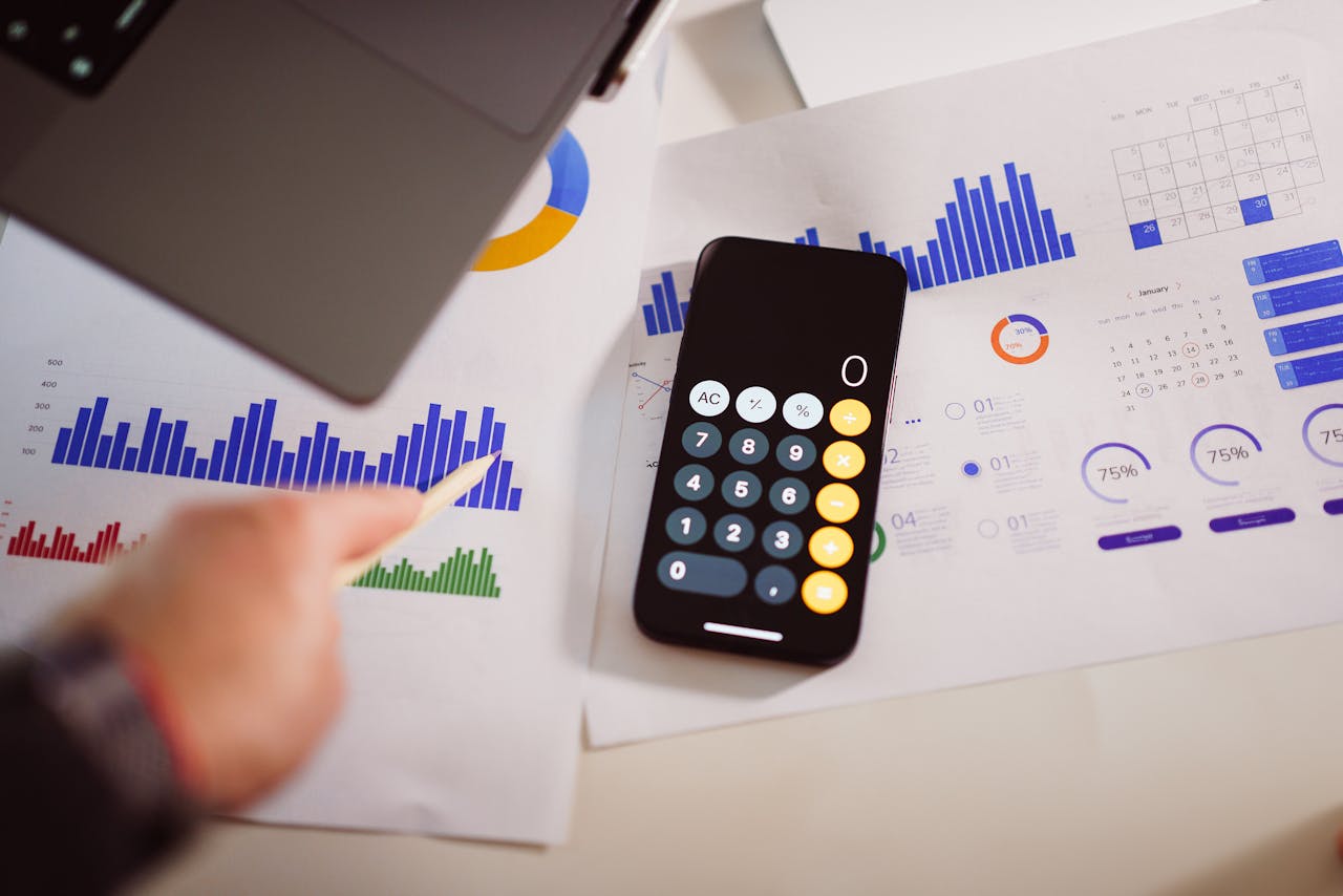 Papers containing graphs and other data behind a calculator